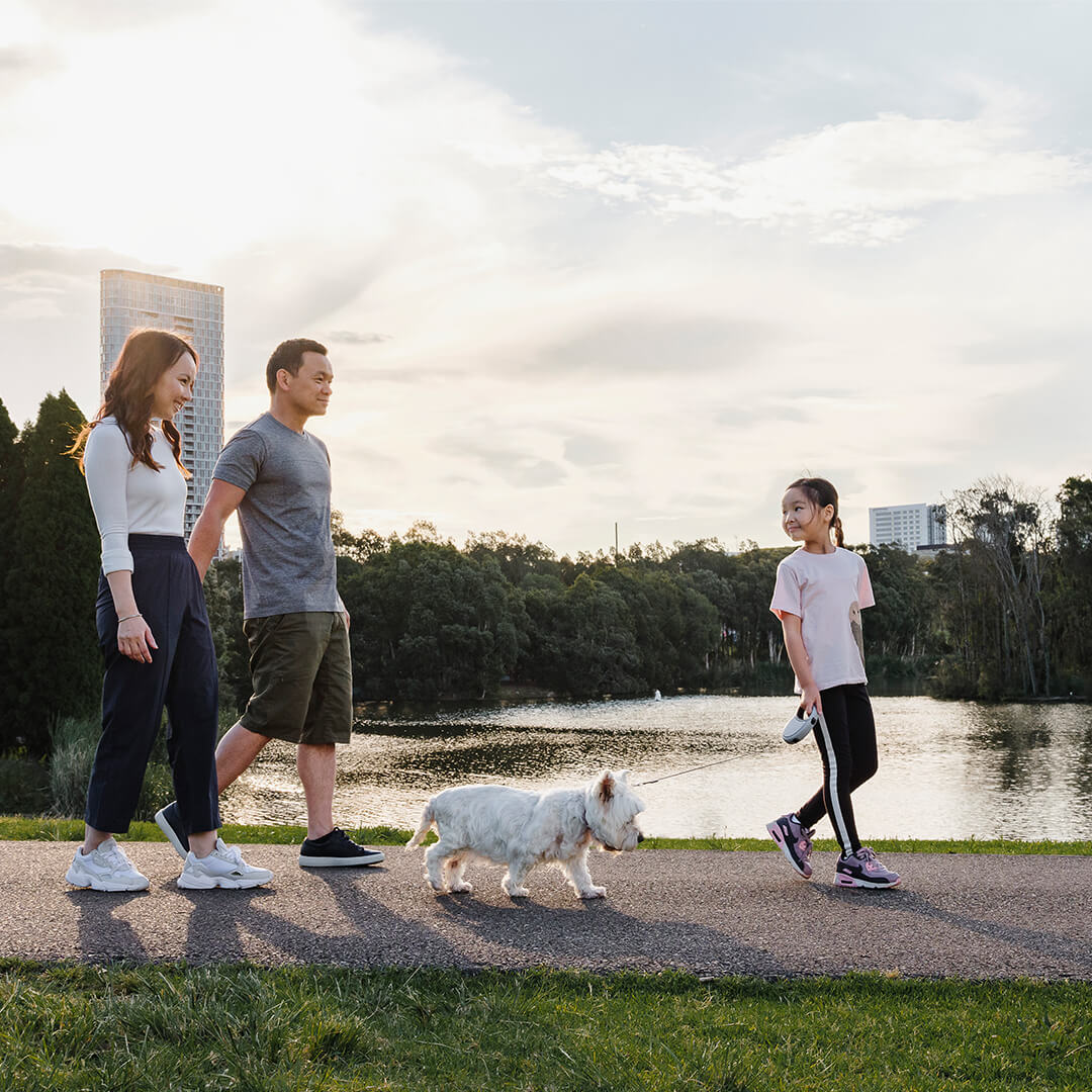 Family walking in Sydney Olympic Park