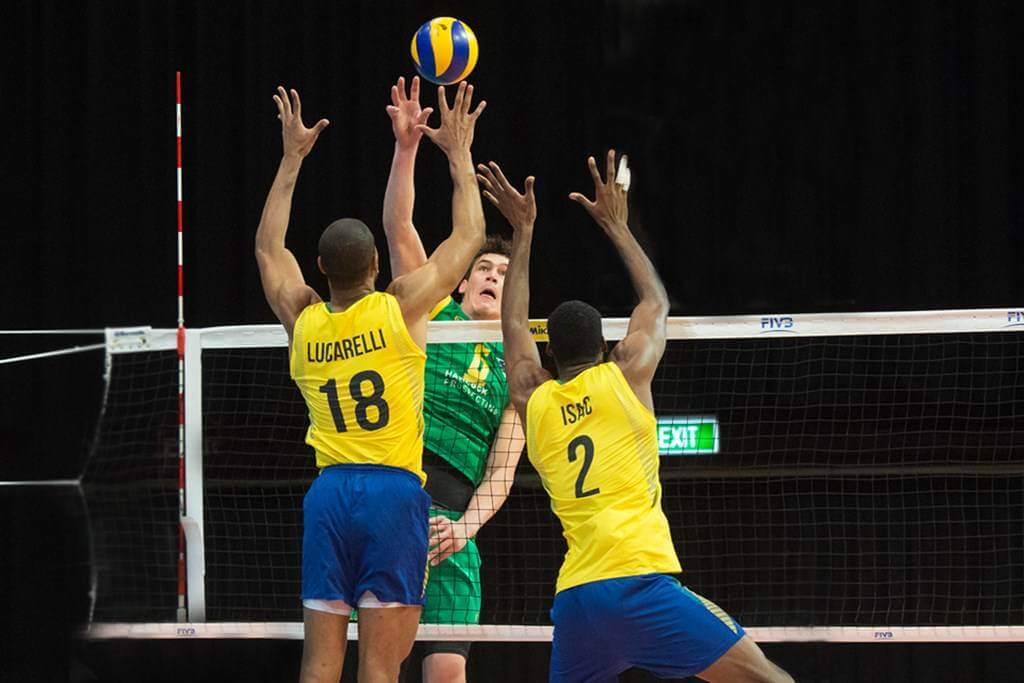 Men playing a game of volleyball