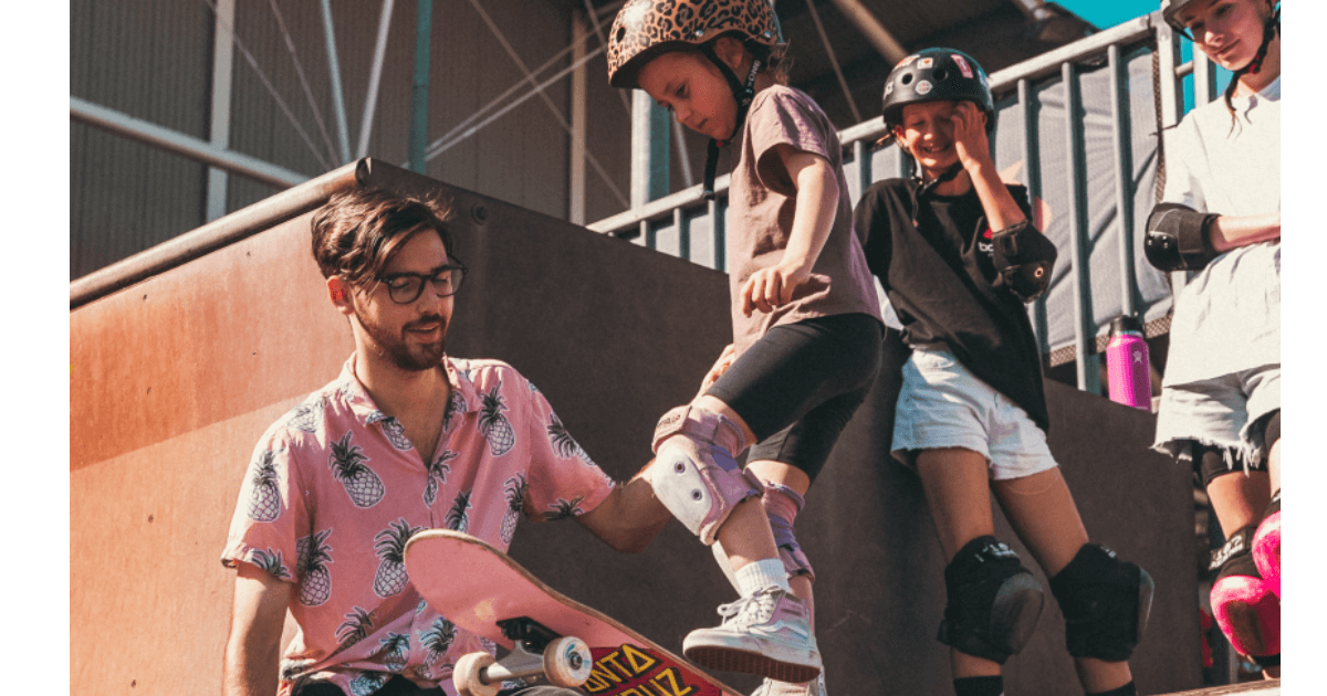 Children with instructor at Monster Skate Park