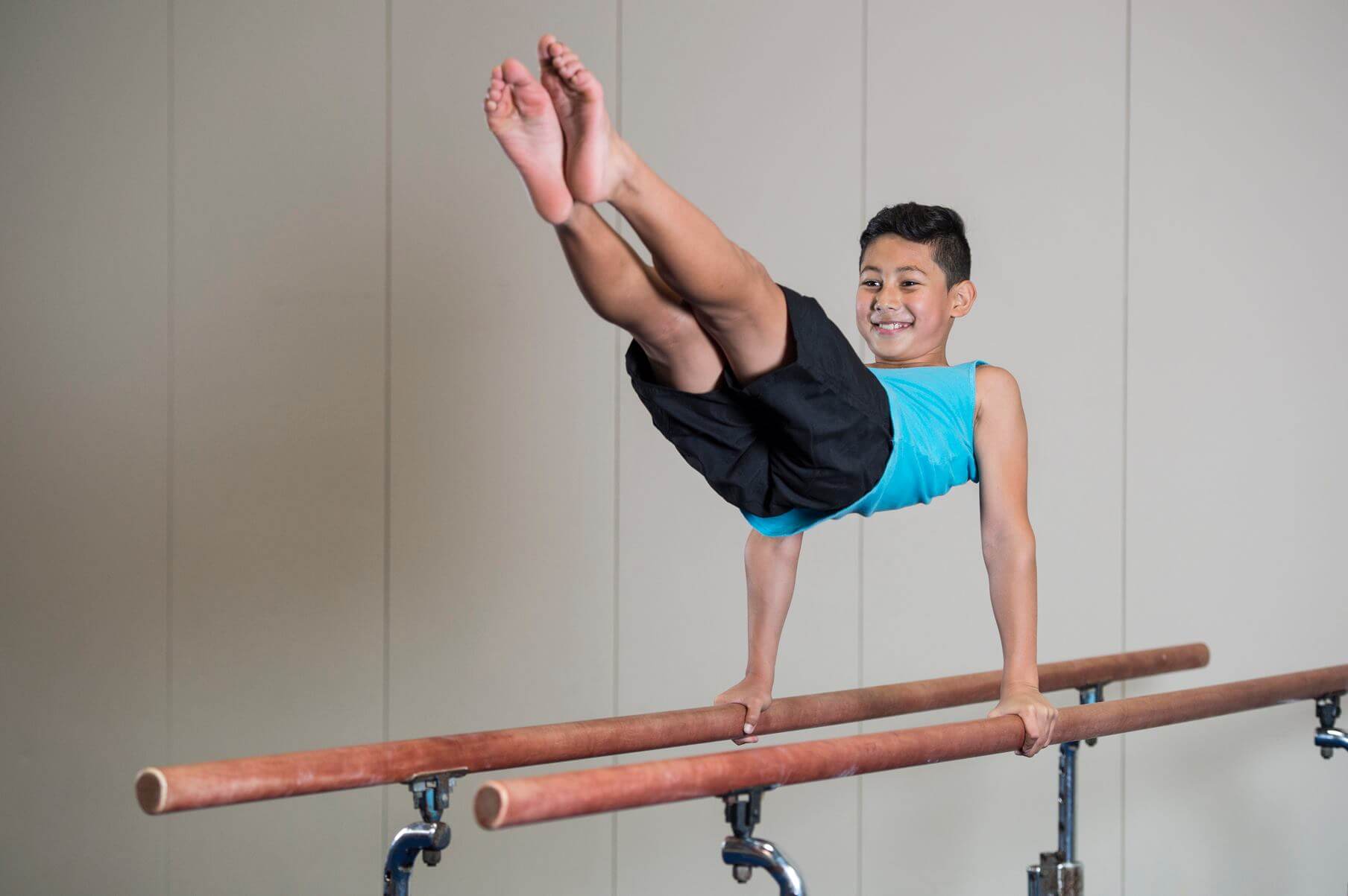 Young boy doing gymnastics