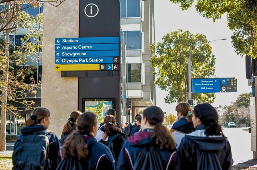 Students walking through the streets of Sydney Olympic Park