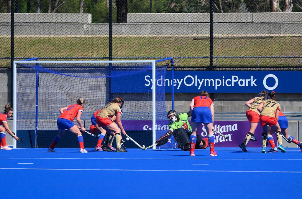 Hockey game on pitch at the Hockey Centre