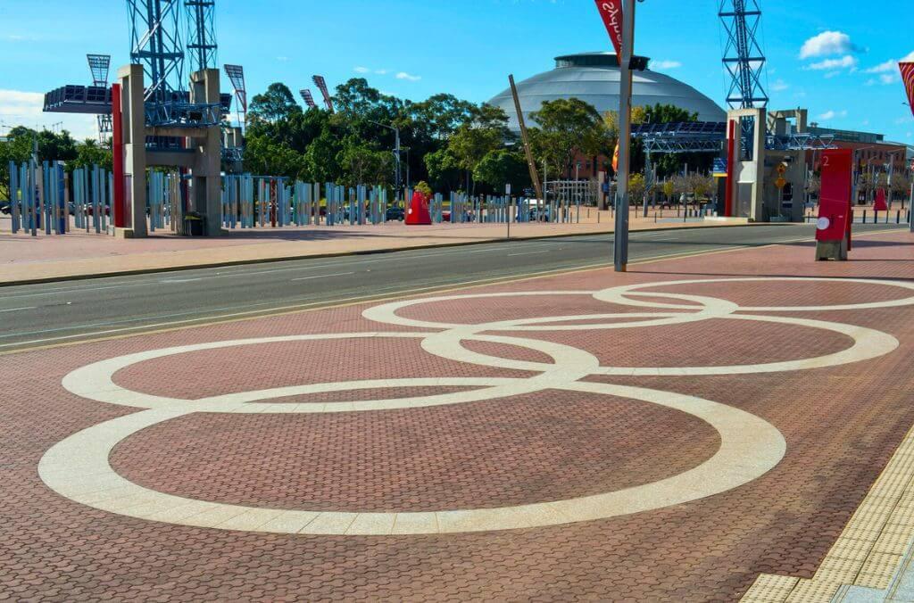 Image of the Olympic logo paint on the street at Sydney Olympic Park